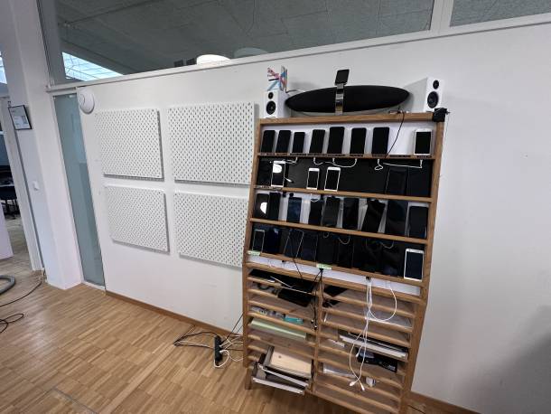 New empty Device wall next to old device wall in our office in Bern
