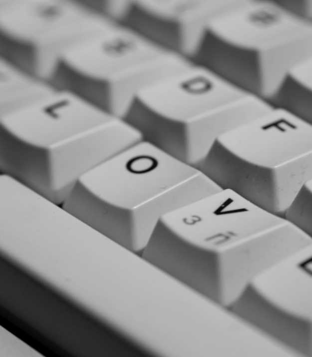 a computer keyboard showing the letters l o v e